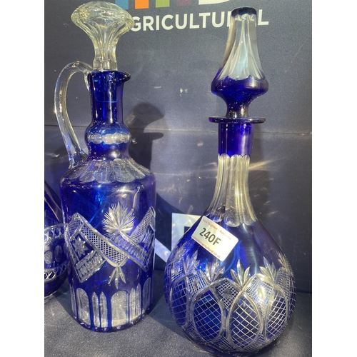 240F - TRIO OF LARGE COLOURED DECANTERS