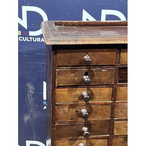 1 - BANK OF DRAWERS