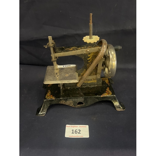 162 - ANTIQUE CHILDS SEWING MACHINE