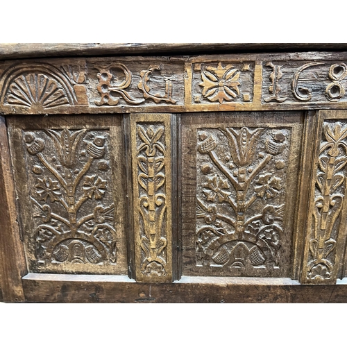 30 - HEAVILY CARVED OAK SWORD CHEST