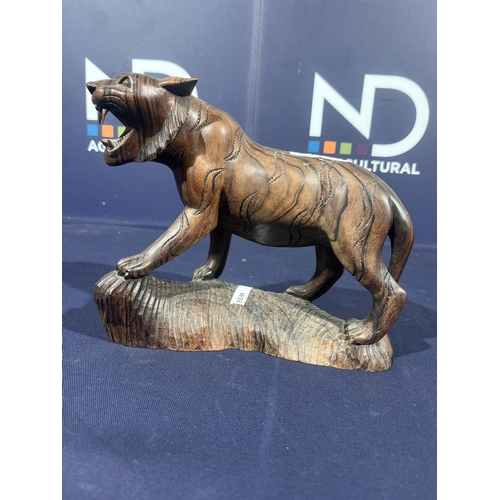 77 - CARVED WOODEN TIGER FIGURE