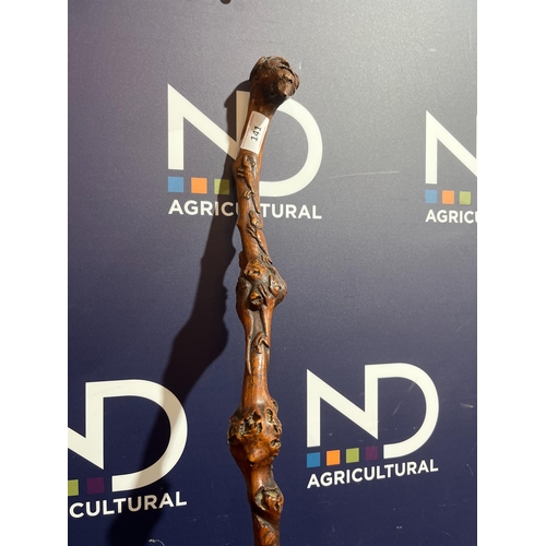 141 - CARVED FOLK ART NAIVE WALKING CANE