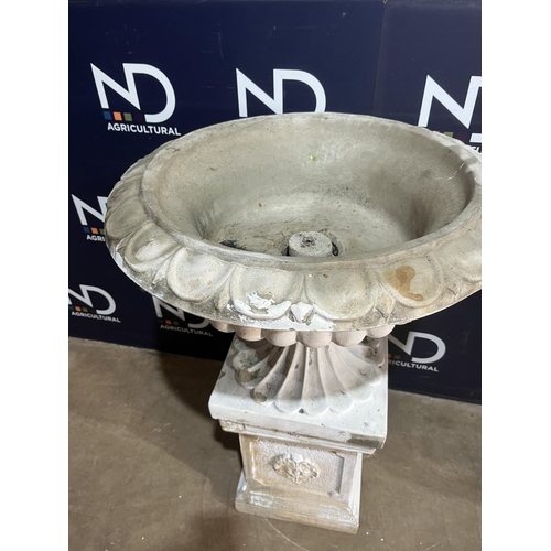 64 - PAIR OF COMPOSITE STONE URNS