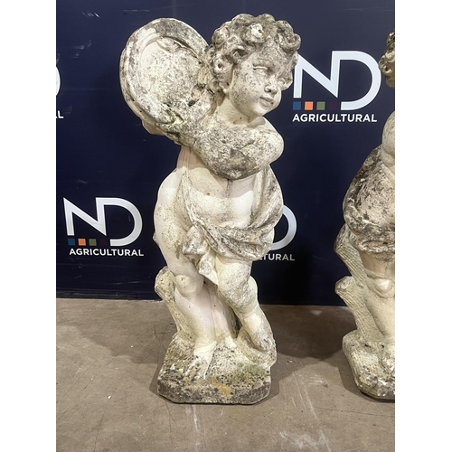 42 - PAIR OF COMPOSITE STONE CHERUBS