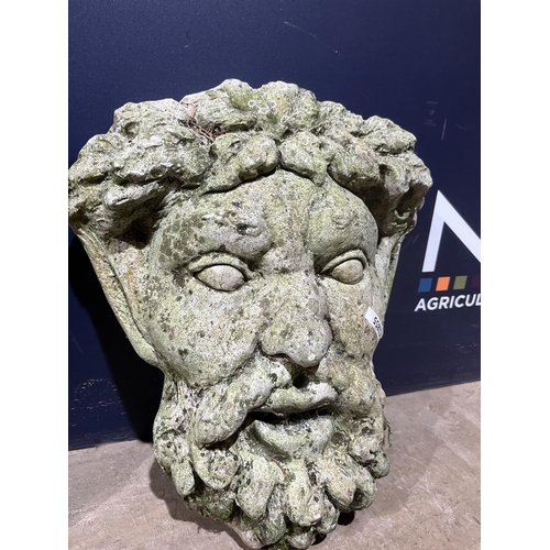 63 - PAIR OF COMPOSITE STONE GARGOYLES