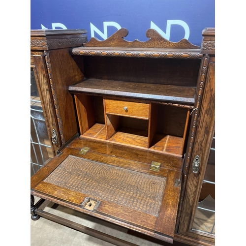 706 - GLASS FRONTED CABINET