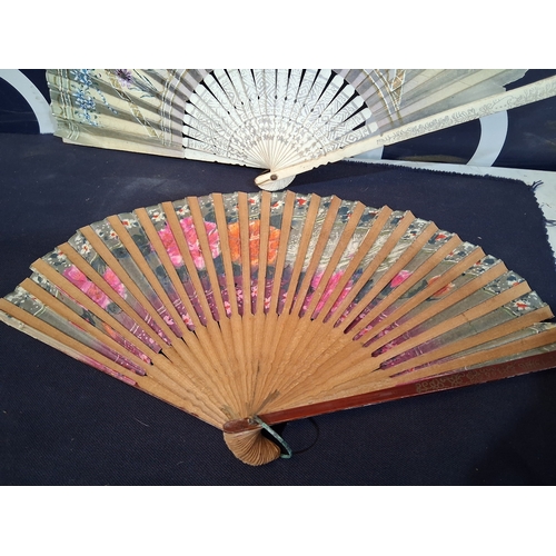 PAIR OF ORIENTAL HAND FANS