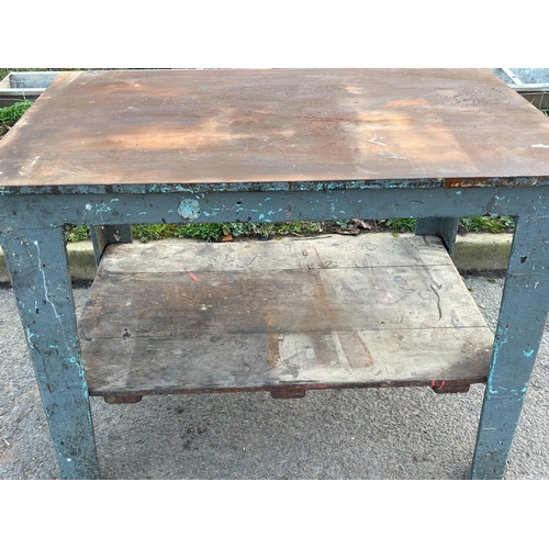 46 - CAST IRON GARDEN TABLE