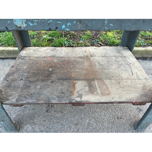 46 - CAST IRON GARDEN TABLE