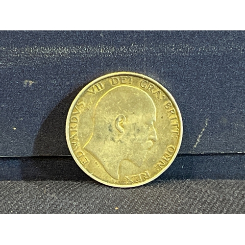 234 - COMMEMORATIVE ONE SHILLING COIN