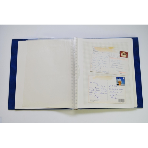 253 - Blue SG Album with a good array of stamps, including a number of Commonwealth 1935 Silver Jubilee it... 