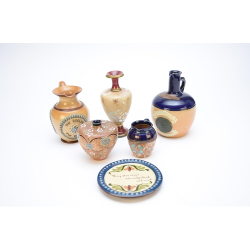 279 - A group of Doulton stoneware smoking-related items, comprising a Royal Doulton tobacco jar and cover... 