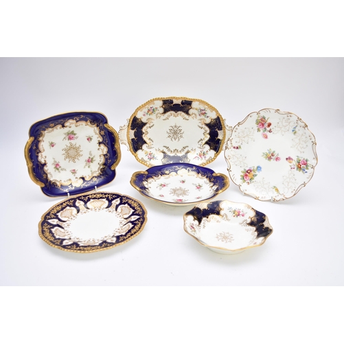 325 - A group of Coalport, late 19th/early 20th century comprising nine dessert plates, pattern X905, prin... 