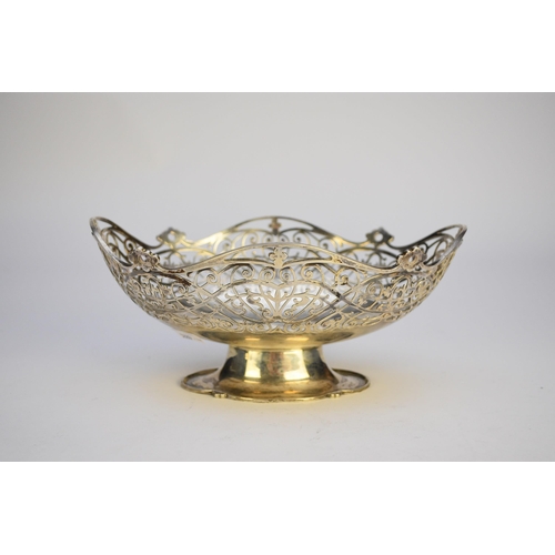 38 - A pedestal silver fruit bowl, Walker & Hall, Sheffield 1928, of oval form with decorative pierced bo... 