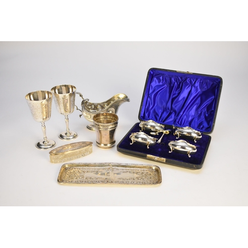 44 - A pair of silver goblets, Birmingham 1966 & 1967, together with a silver sauce boat, London 1896, a ... 