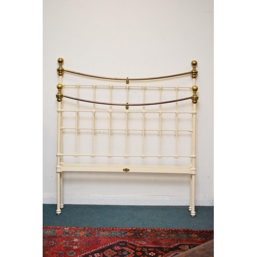 574 - Two painted iron 4' bedsteads, by Seventh Heaven, of typical form, one painted off-white and other b... 