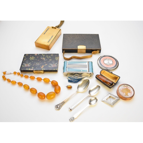 59 - A collection of compacts and costume jewellery, to include; a compact in the form of a pruse, a circ... 