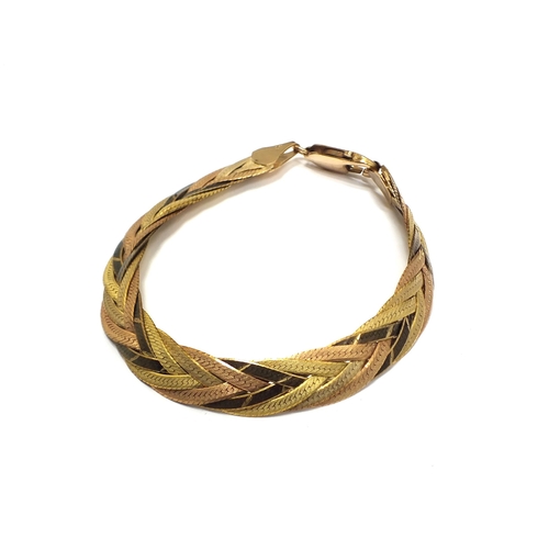 65 - A 9ct tri-coloured gold bracelet, of plaited design with lobster fastening, 17.5cm long, weight appr... 