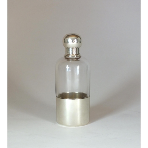 8 - A Victorian silver mounted glass hip flask, Sampson Mordan & Co, London 1893, the flask of cylindric... 