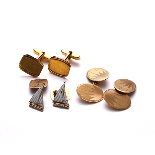 86 - A pair of 9ct gold and enamel cufflinks, each formed as an enamelled sailing boat with attached engr... 