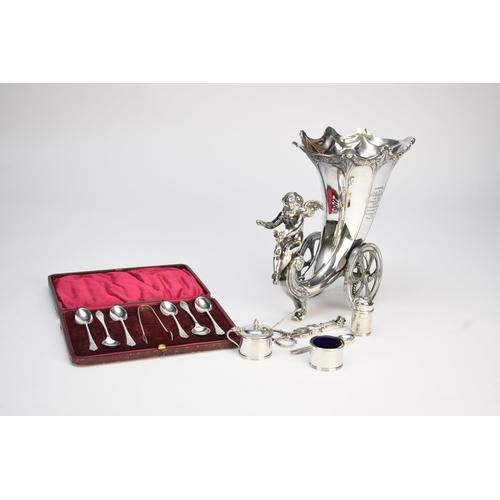 1 - WMF, A Jugendstil silver plated table centrepiece, designed as a cherub riding a cornucopia vase on ... 