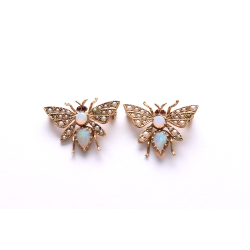 108 - Two 9ct gold opal, seed pearl and ruby set butterfly brooches, each approx 27mm wide, total weight a... 