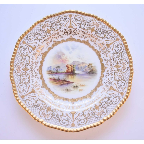 109 - A Coalport cabinet plate, early 20th century, painted with a view of the River Severn in Shrewsbury ... 