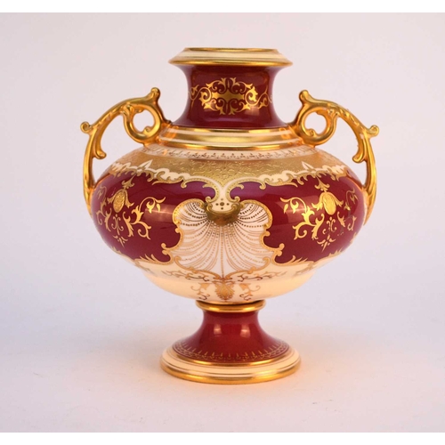 127 - A Coalport vase, circa 1891-1919, of compressed form with twin scrolling handles the claret and yell... 