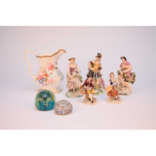 135 - A mixed group of ceramics, comprising two Derby porcelain figures, 18th century, the first of a gent... 