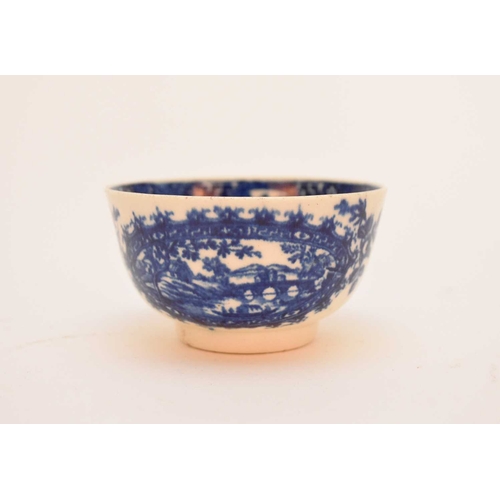 15 - A Worcester 'Circled Landscape' tea bowl, circa 1780-85, transfer-printed in underglaze blue, disgui... 