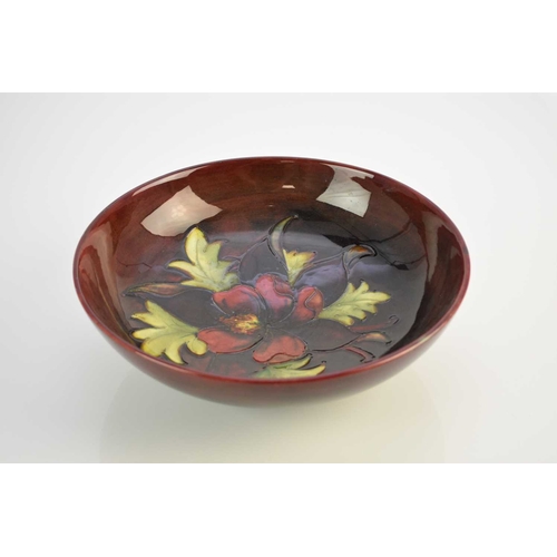 195 - A Walter Moorcroft 'Columbine' flambe bowl, circa 1948, impressed and painted WM signature, 24cm dia... 