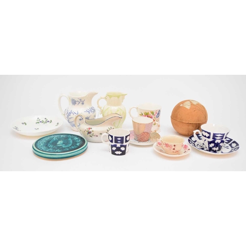 20 - An assorted group of ceramics, including a Worcester 18th century fluted teacup and two orphaned sau... 