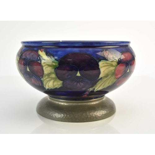 201 - A William Moorcroft 'Pansy' fruit bowl with a Tudric pewter pedestal base, circa 1912, underside bas... 