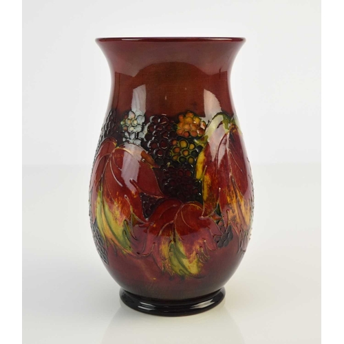 222 - A William Moorcroft flambe 'Leaf and Blackberry' vase, circa 1935, impressed marks and painted WM si... 