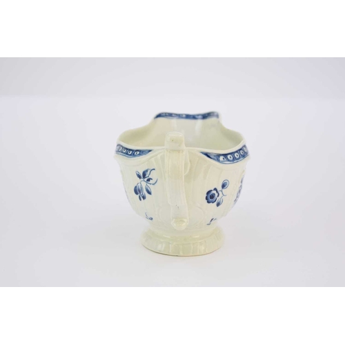 29 - A large Worcester 'Strap-fluted Floral' sauceboat circa 1770-75 painted in underglaze blue, moulded ... 