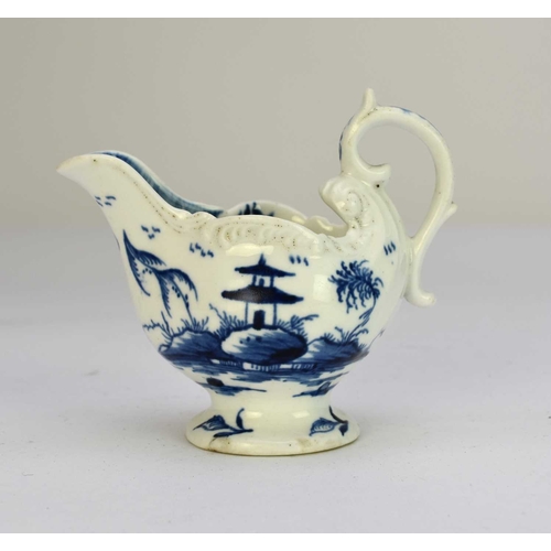 30 - A Derby porcelain 'Cannonball' dolphin cream boat circa 1765-9 painted in underglaze blue, unmarked,... 