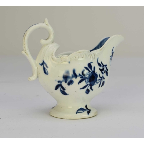 30 - A Derby porcelain 'Cannonball' dolphin cream boat circa 1765-9 painted in underglaze blue, unmarked,... 