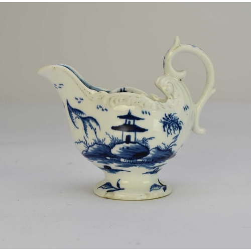 30 - A Derby porcelain 'Cannonball' dolphin cream boat circa 1765-9 painted in underglaze blue, unmarked,... 