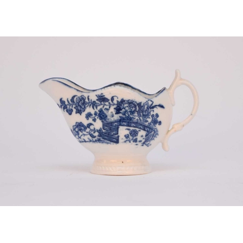 31 - A Caughley cream or gadroon boat, circa 1785, transfer-printed in underglaze blue with the 'Fence' p... 