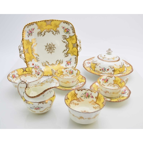 34 - A Coalport batwing tea/breakfast service in the rare yellow colourway, early 20th century, comprisin... 