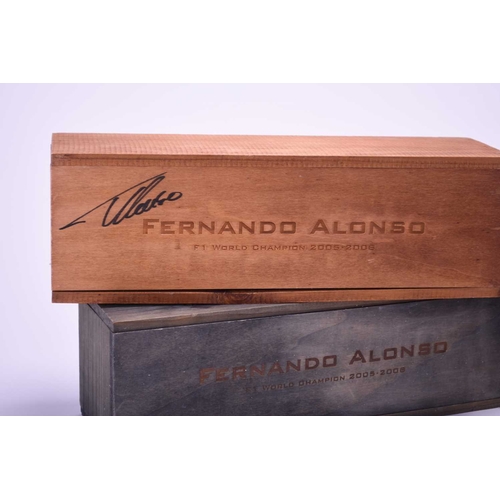 378 - A cased magnum Fernando Alonso 2003, number 1606 in an edition of 2500, the wood case signed by Fern... 