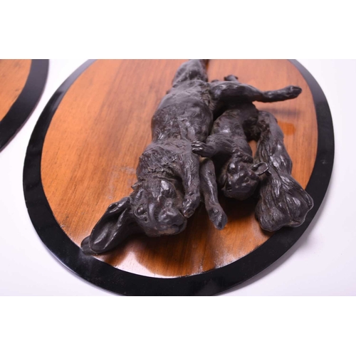 379 - A pair of late 19th century patinated spelter game groups, depicting hares and a squirrel, set on pa... 