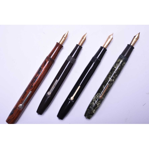 385 - Four vintage Conway Stewart fountain pens Including: A number 15, black; number 28 MK1, black; numbe... 