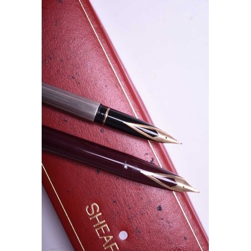 388 - Two Sheaffer fountain pens, boxed A PFM III, maroon, and a Targa, sterling silver. (2)