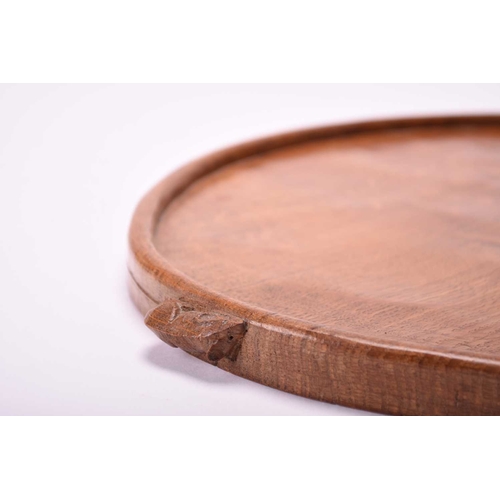 399 - Studio of Robert Mouseman Thompson (Kilburn), an adzed oak tea tray Of kidney shape with signature m... 