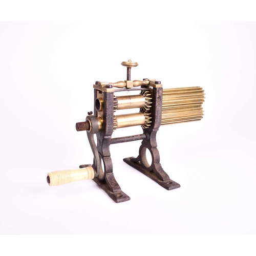 405 - Two 19th century crimping machines With brass crimping rollers set into cast iron bases, one with a ... 