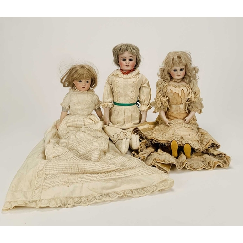 410 - Three German bisque-headed dolls The first Ernst Heubach, no.7, with blond wig, fixed blue eyes and ... 