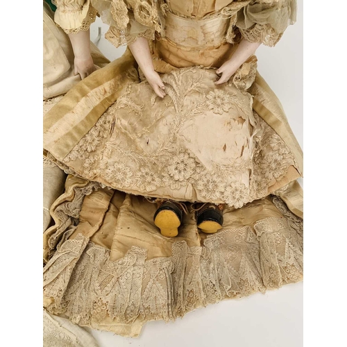 410 - Three German bisque-headed dolls The first Ernst Heubach, no.7, with blond wig, fixed blue eyes and ... 