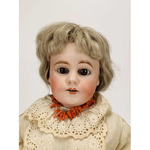 410 - Three German bisque-headed dolls The first Ernst Heubach, no.7, with blond wig, fixed blue eyes and ... 