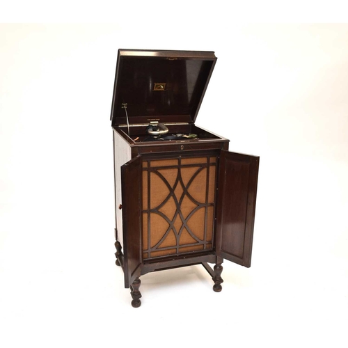 421 - An HMV (His Master's Voice) model 163 cabinet wind-up gramophone Enclosed in a mahogany veneered cab... 